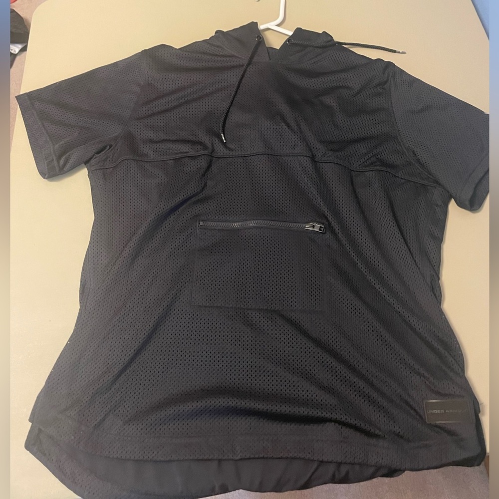 Black Under Armour short sleeve hooded pullover with one front zipper pocket
